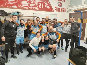 Giocatori e staff festeggiano