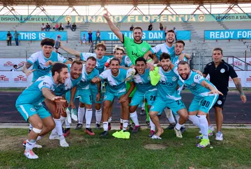 Foto di gruppo sotto la tribuna